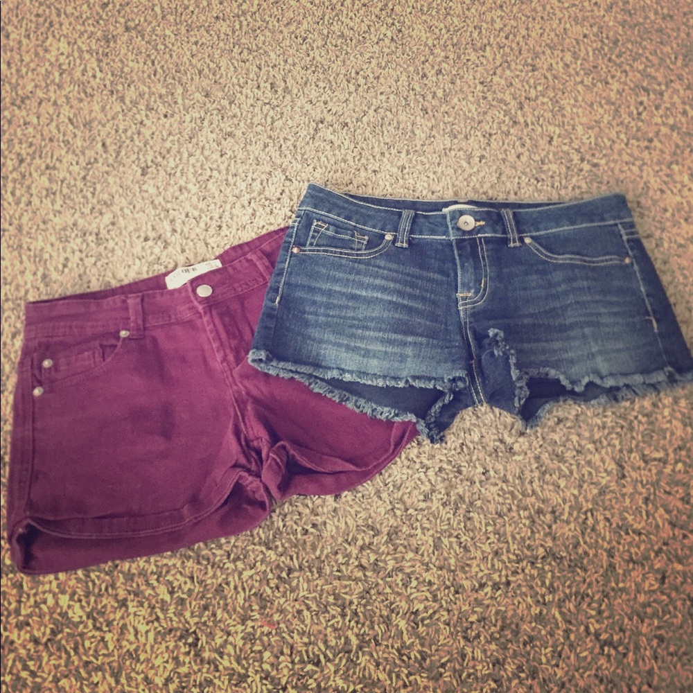 Burgundy and denim shorts with pockets.