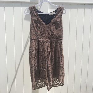 Taupe lace overlay with dark blue underneath