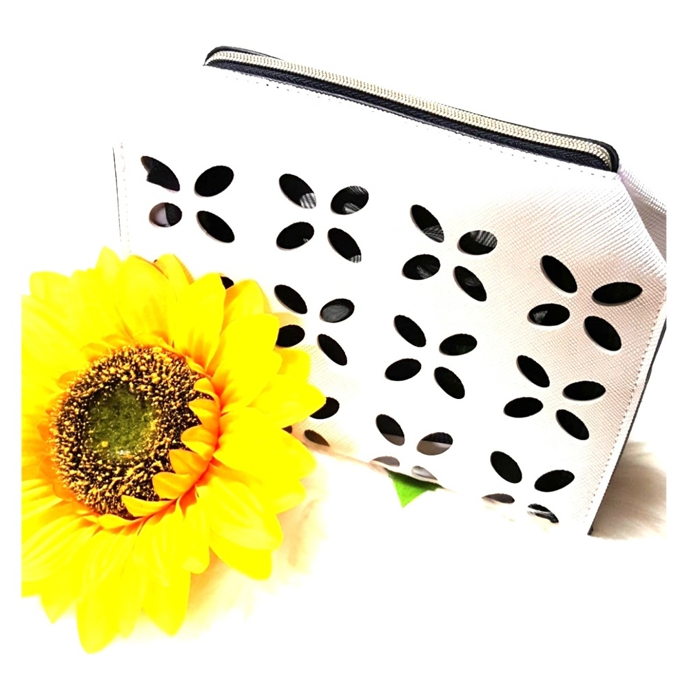 Estee Lauder white perforated makeup bag