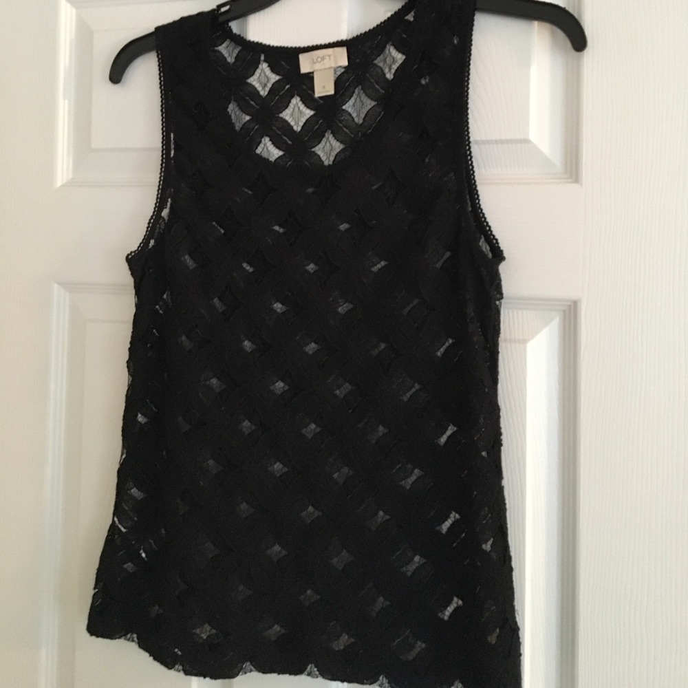 Size small, lace shirt. Perfect for work!