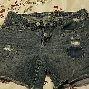 Distressed denim shorts