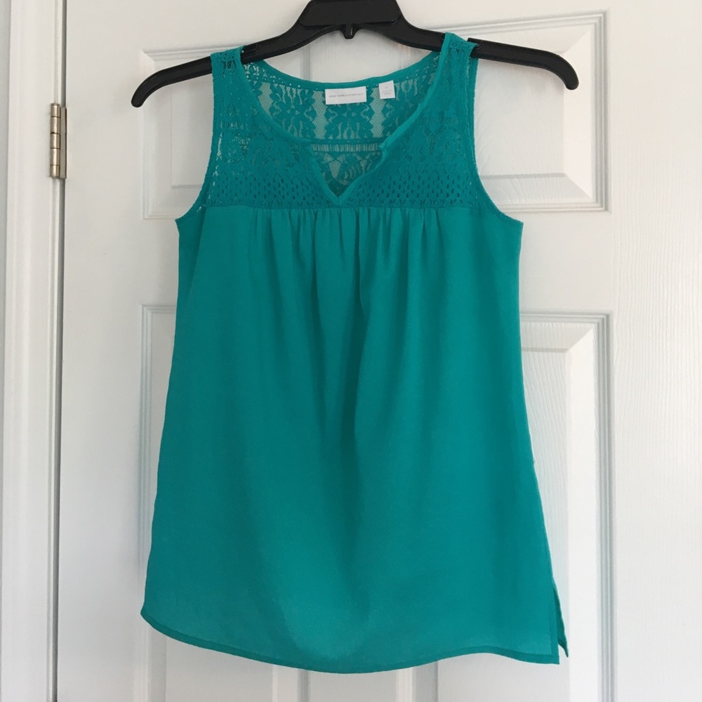 Flowy, teal tank with lace detail.