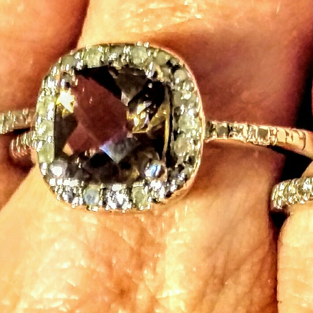 Smokey Topaz surrounded by diamonds on Sterling Si