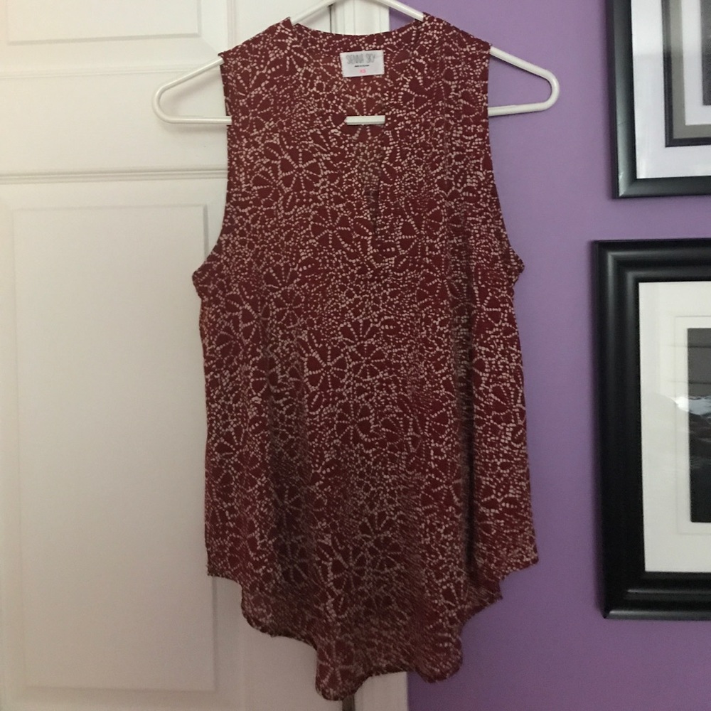 Red and White Sleeveless Blouse