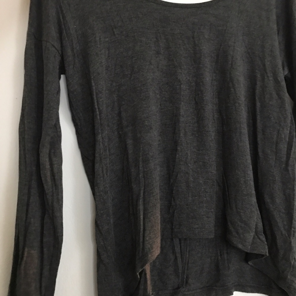 Slightly cropped open back long sleeve shirt