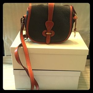 Dooney and Bourke- All weather leather