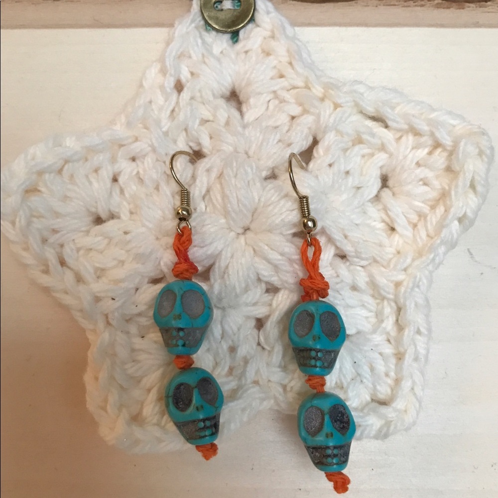 Double skull earrings