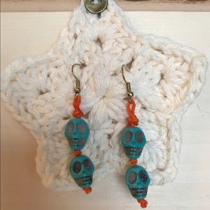 Double skull earrings