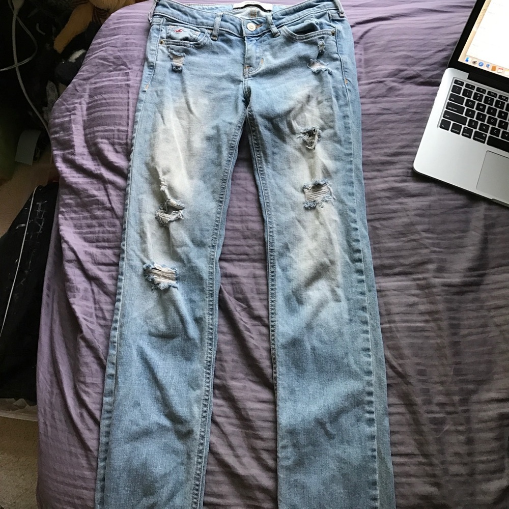 Low rise distressed boot-cut jean