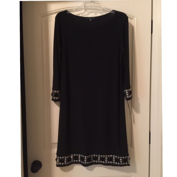 Dresses & Skirts - Black dress with embellishments