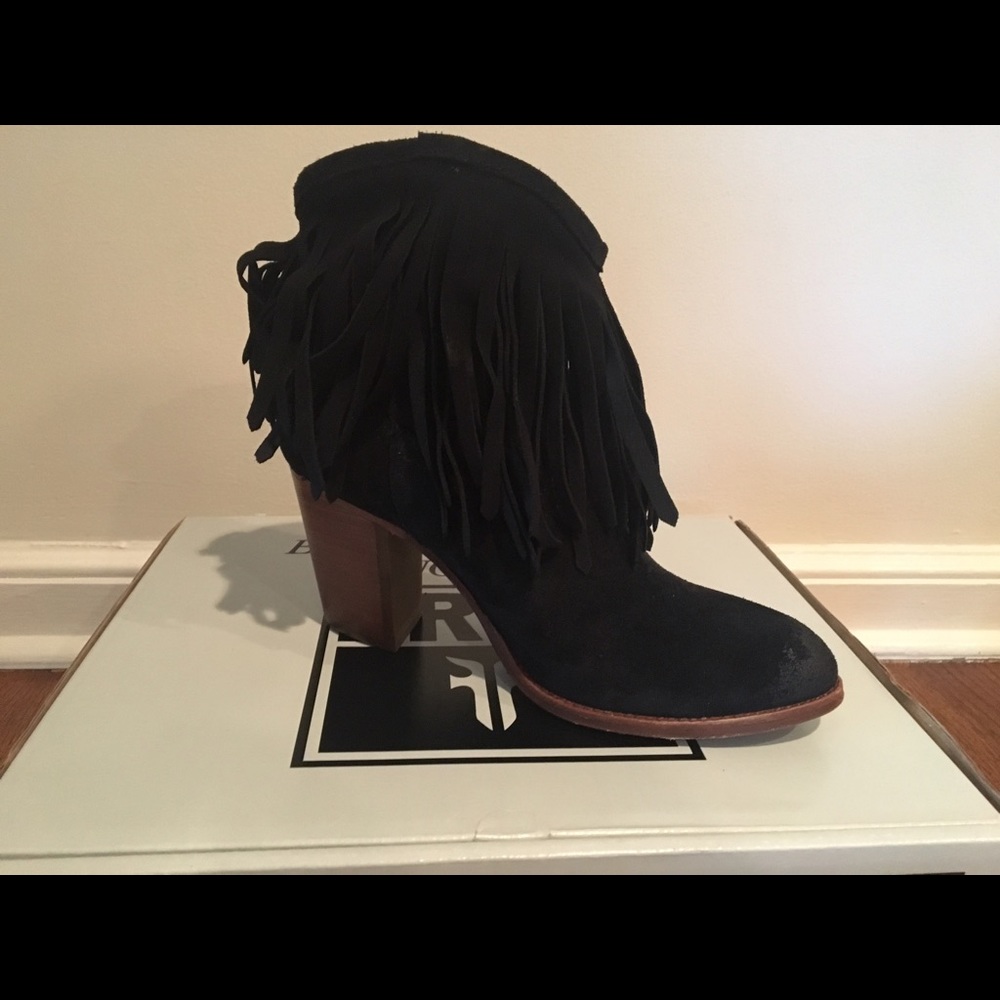 Frye black fringed boots