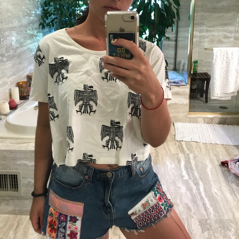 Boxy tribal crop top.