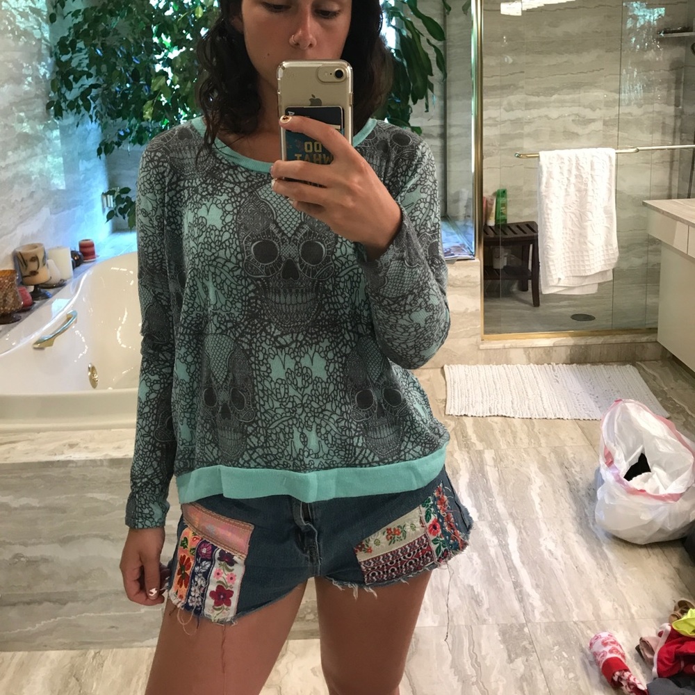 Soft knit skull long sleeve.