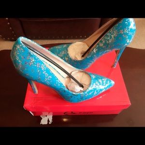 Blue and silver pump in sz 8.5