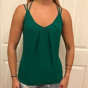 Green flowy sleeveless blouse