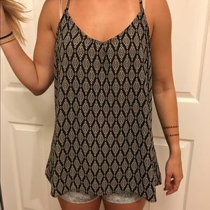 Black and white sleeveless blouse