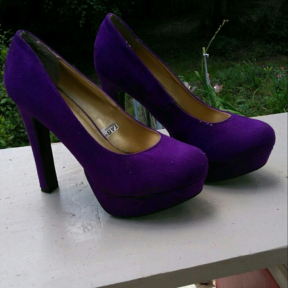 Purple suede pumps