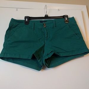American Eagle teal color shorts.