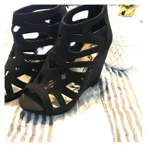 Caged black suede wedges