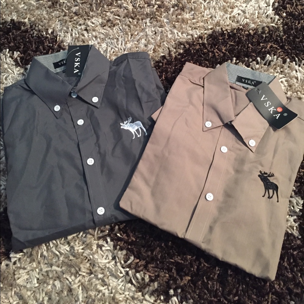 2 Casual Shirts. Size runs small.