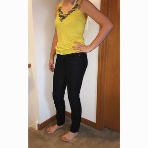 Yellow tank top, with beautiful beads.
