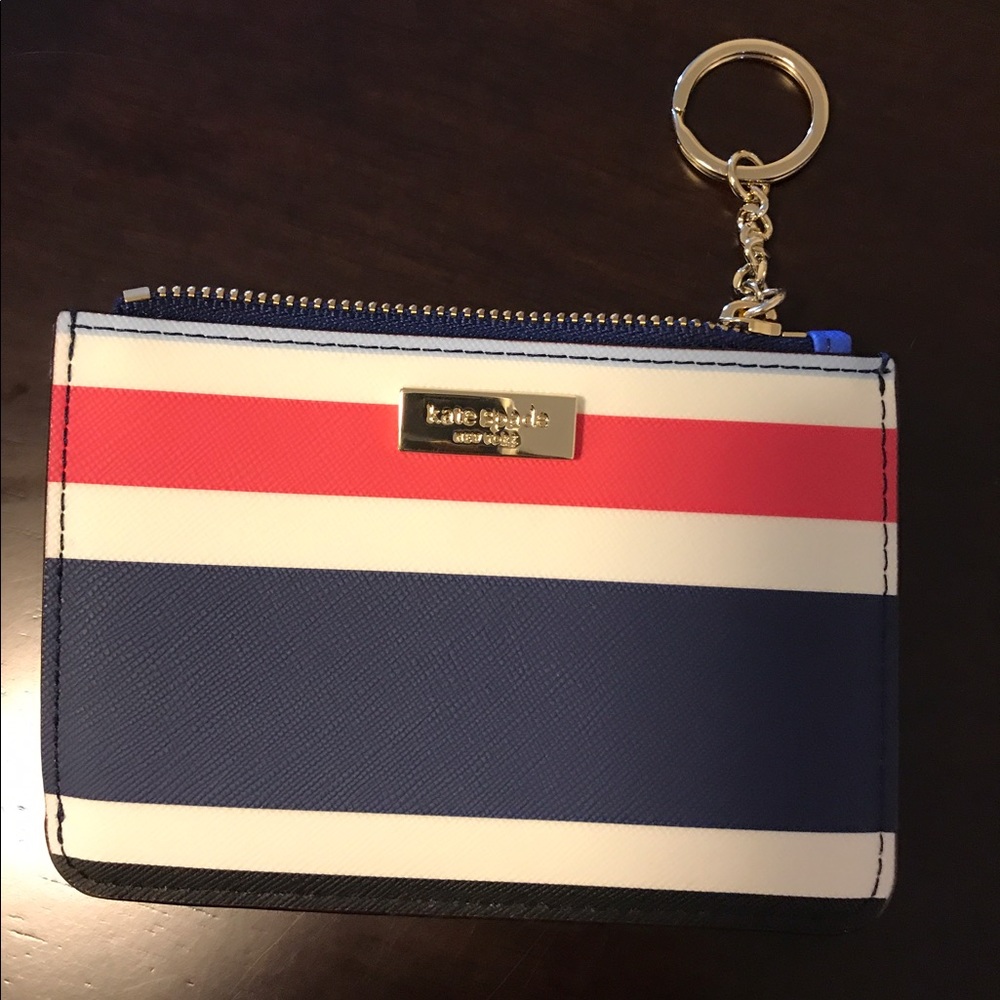 Authentic Kate Spade laurel way printed key pouch.