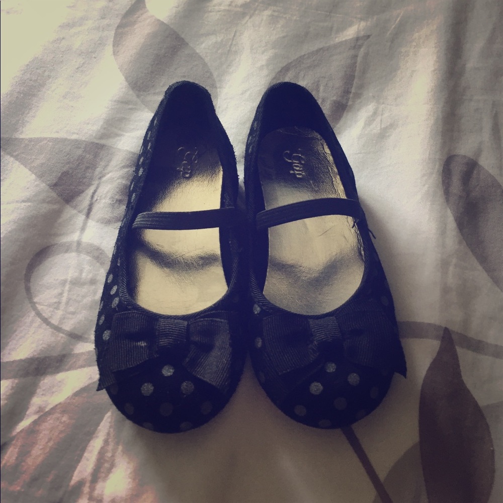 I am selling two little girl shoes