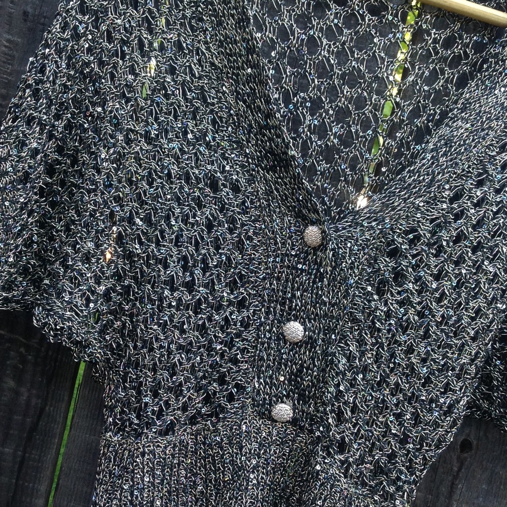Knitted metallic parte sweather top.