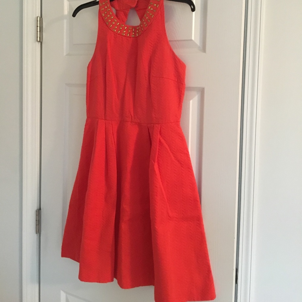 Fun Fit and Flare Coral Dress with Back Cut Out