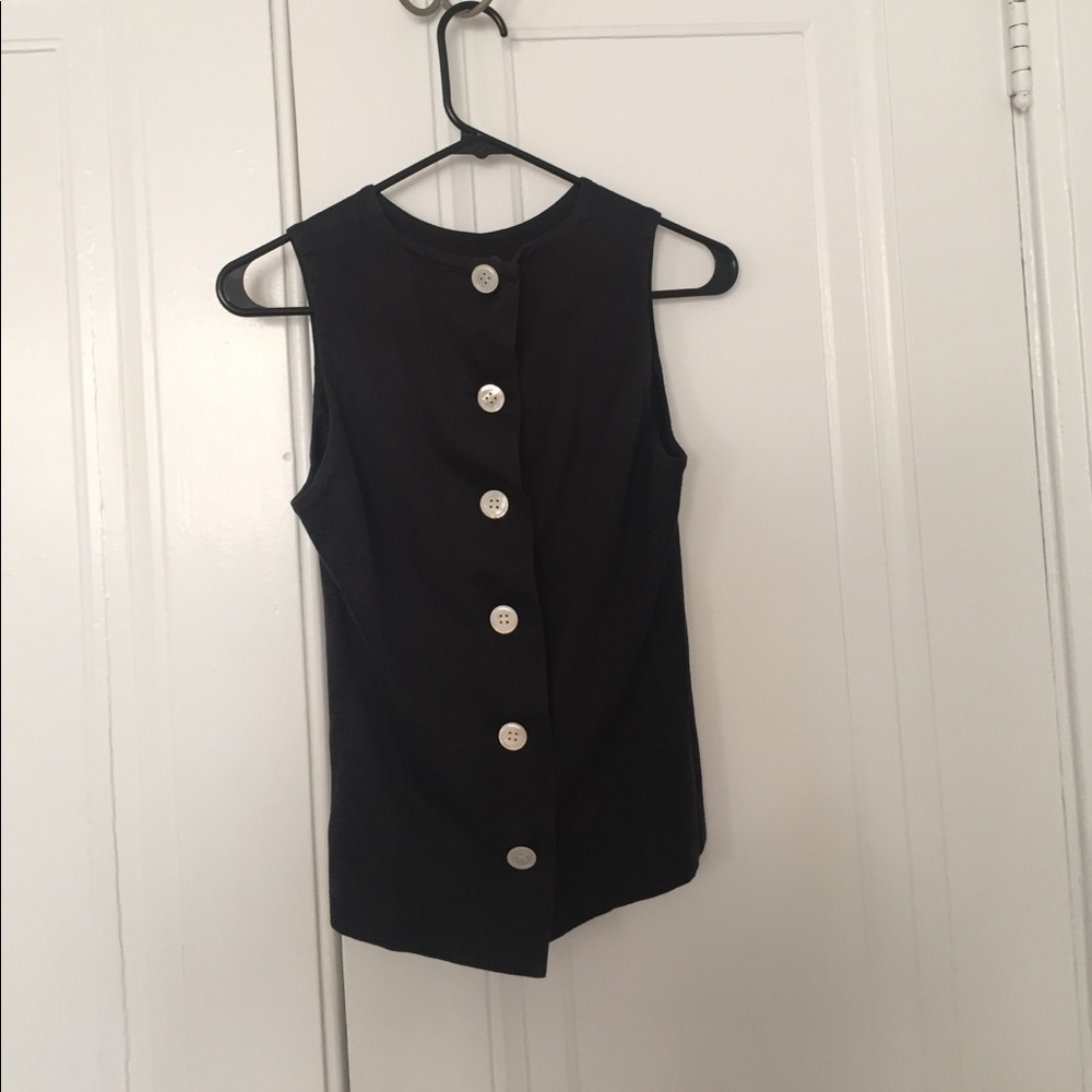 Adorable black vest with white buttons