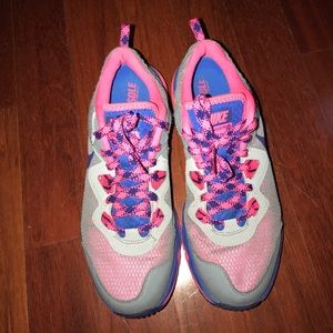 Grey blue and pink Nike running shoes