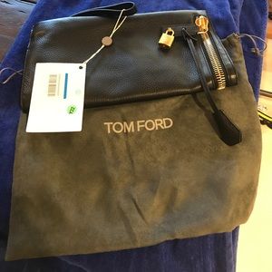 Brand new with Tom Ford clutch.