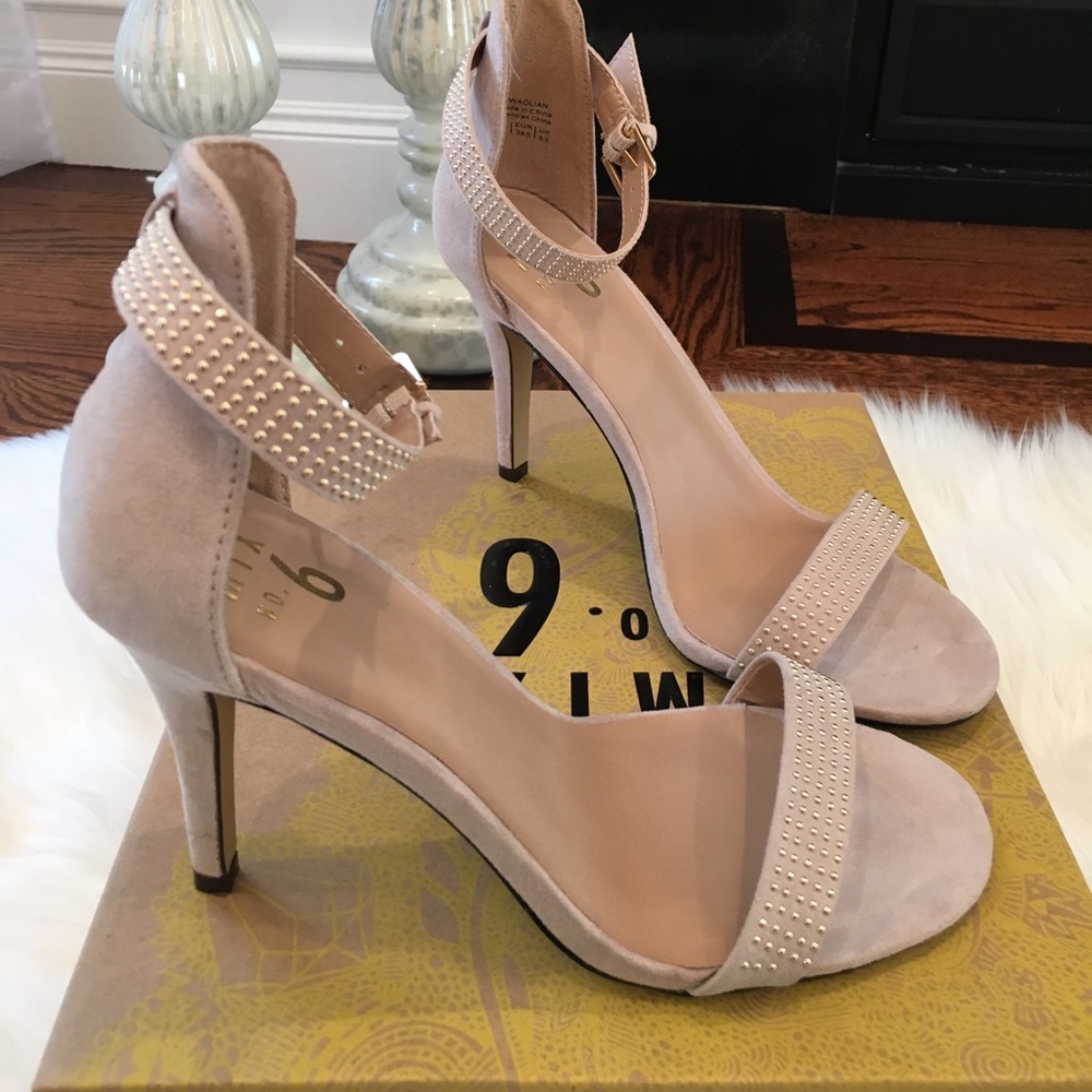 Nude suede ankle strap sandal.