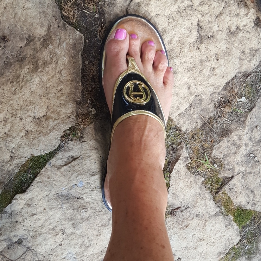 Black and gold patent leather