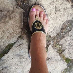 Black and gold patent leather