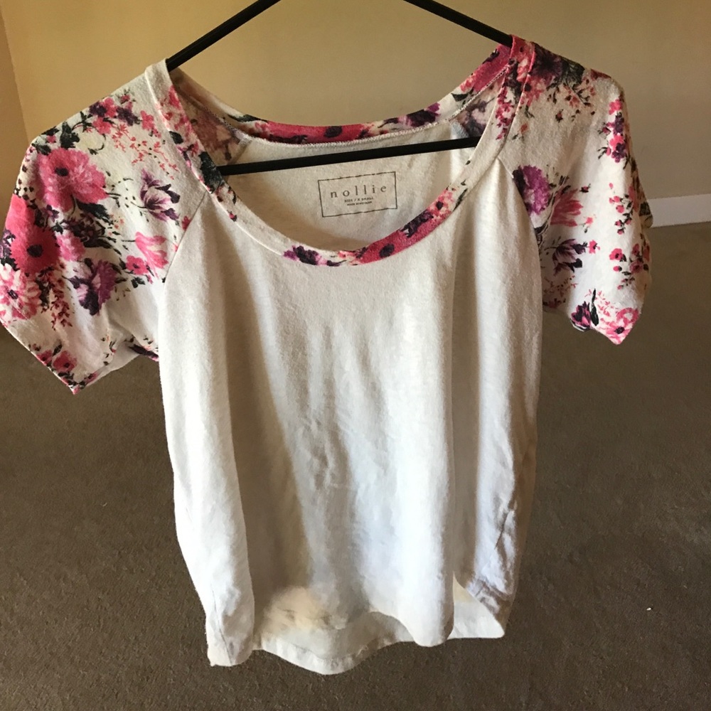 White t-shirt with floral sleeves and collar
