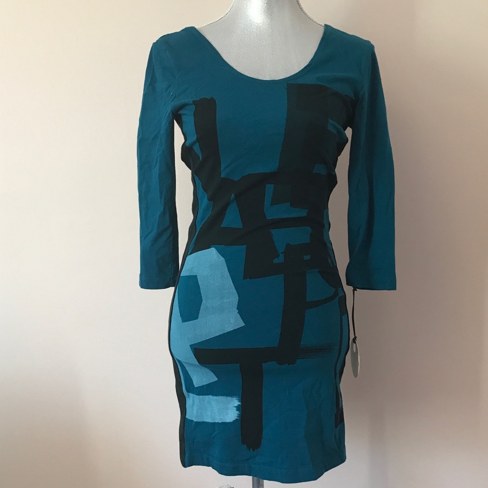 Blue tight mini dress with a scoop back.
