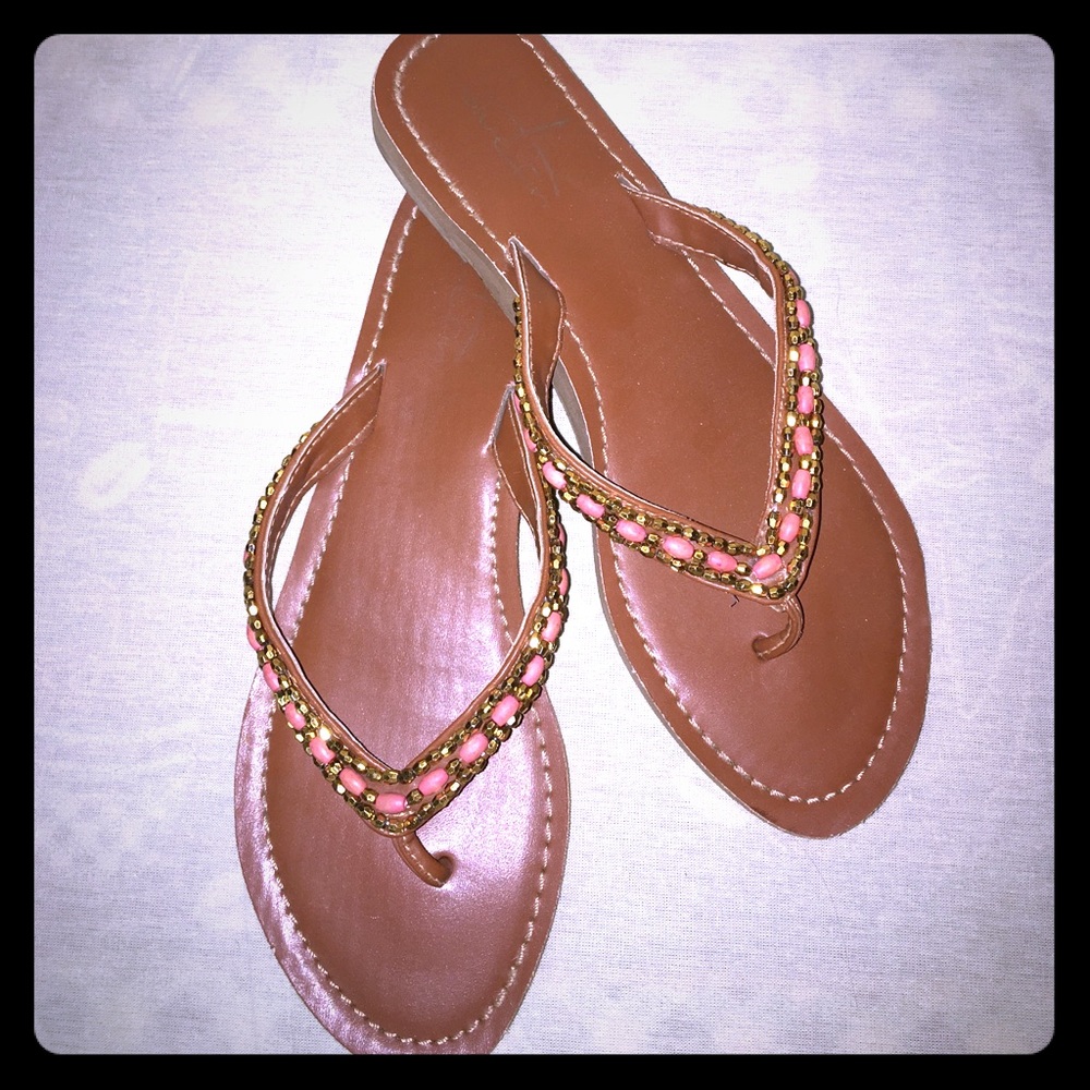 Bluefin brown flip flops with gold and coral beads