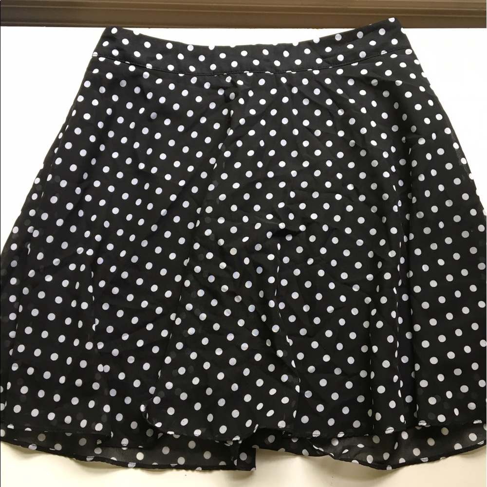 A polka dot skater skirt. KIDS large