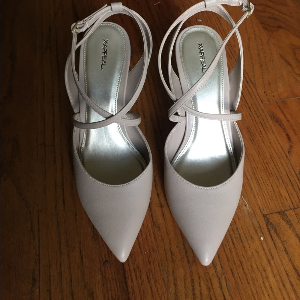 Nude strappy heels