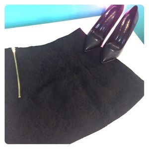 Black Mini Skirt w/imprinted design