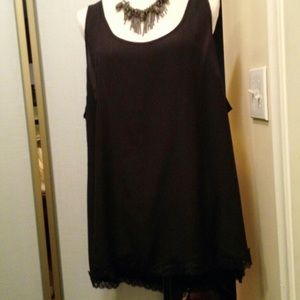 Cute tank with lace detail on bottom