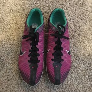 Purple and green Nike racers