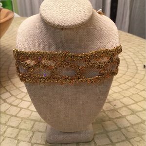 Gold chocker.