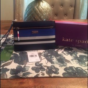 Kate spade wristlet, authentic and new with tag