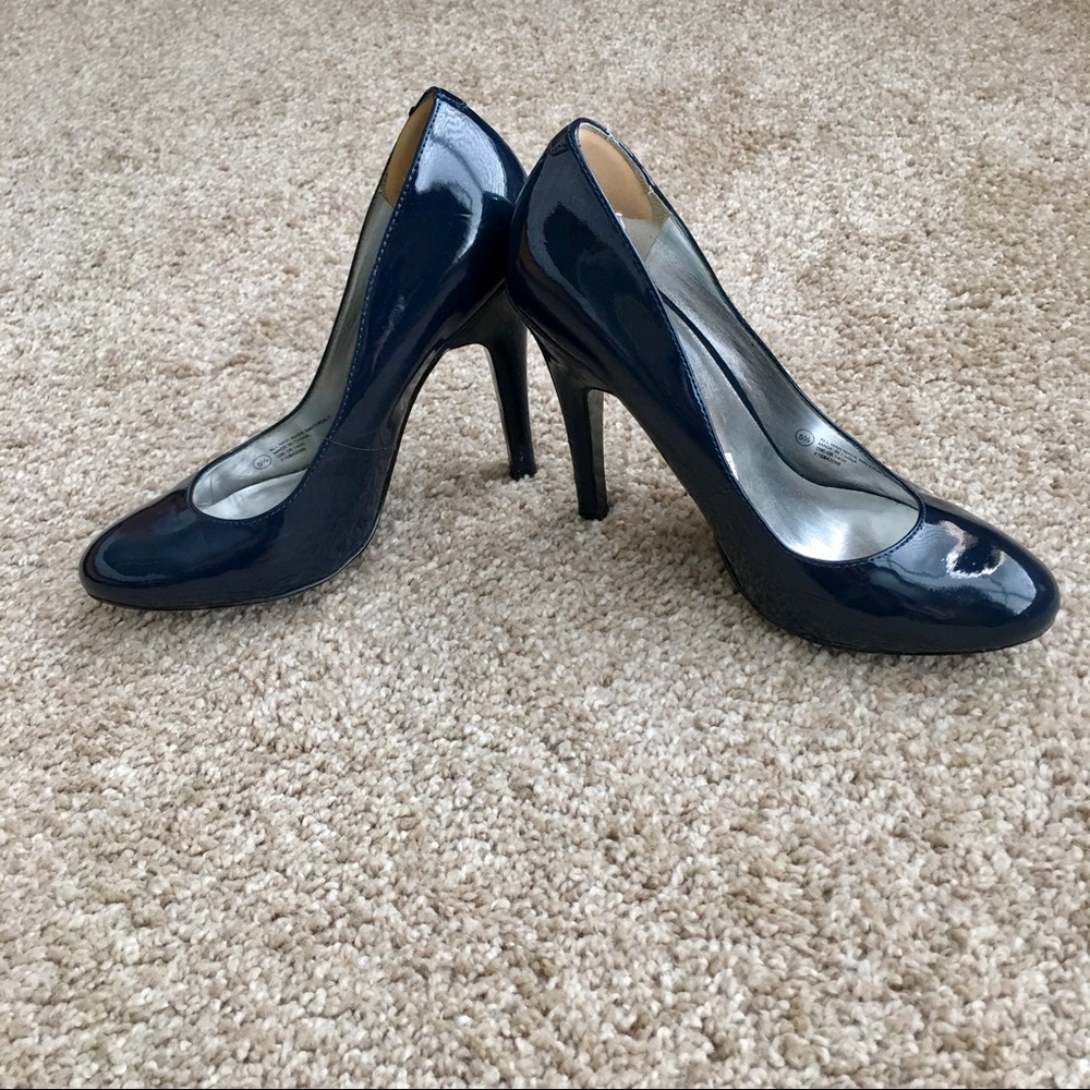 Navy blue patent pumps