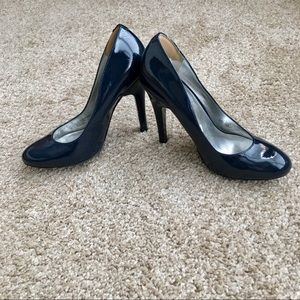 Navy blue patent pumps
