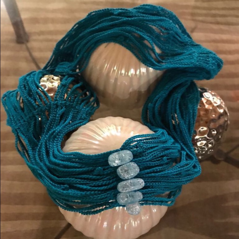 Blue scarf with small blue pebbles
