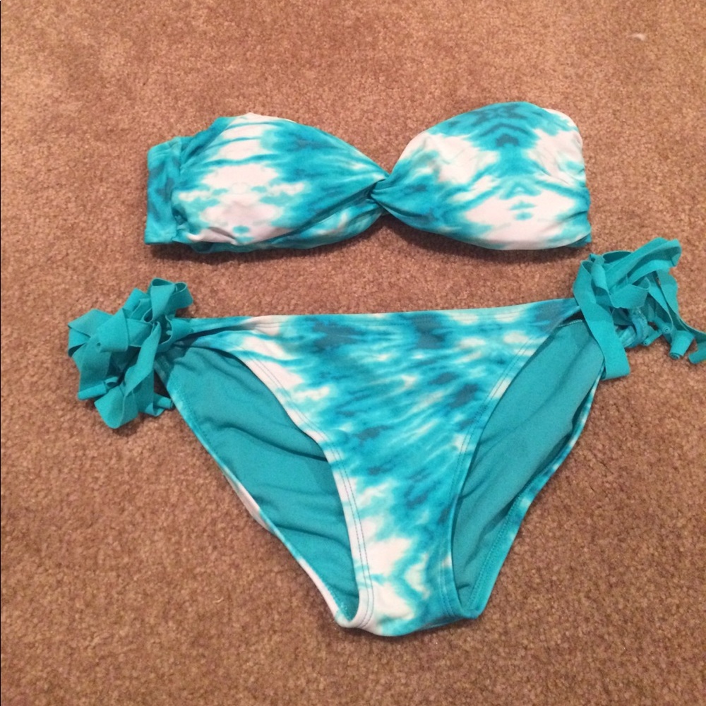 Turquoise and white bathing suit