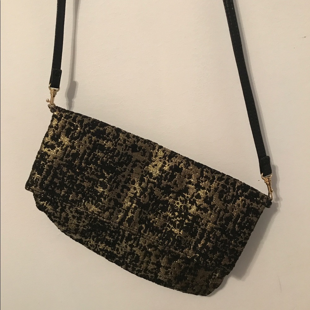 Gold and black cross clutch bag
